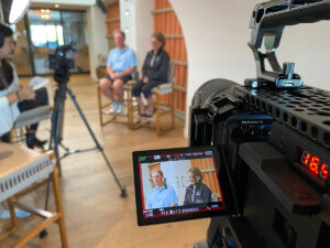 Behind the scenes photo of a commercial photography and videography shoot at Starr Pass in Tucson, Arizona