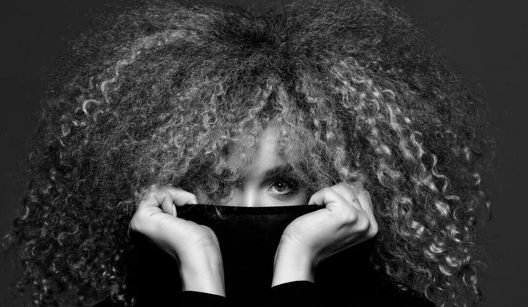 Professional brand photography portrait of a woman emphasizing her eyes and visual expression