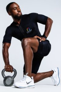OHM Fitness male athlete wearing branded fitness suit in Phoenix commercial photography shoot
